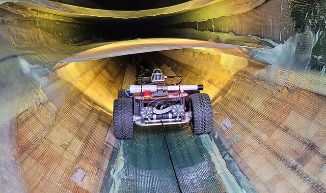 A wheeled robot that inspects a rotor blade from the inside