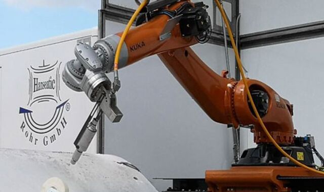 A robot equipped with a waterjet cutter can precisely cut sections of the rotor blade made of different materials.